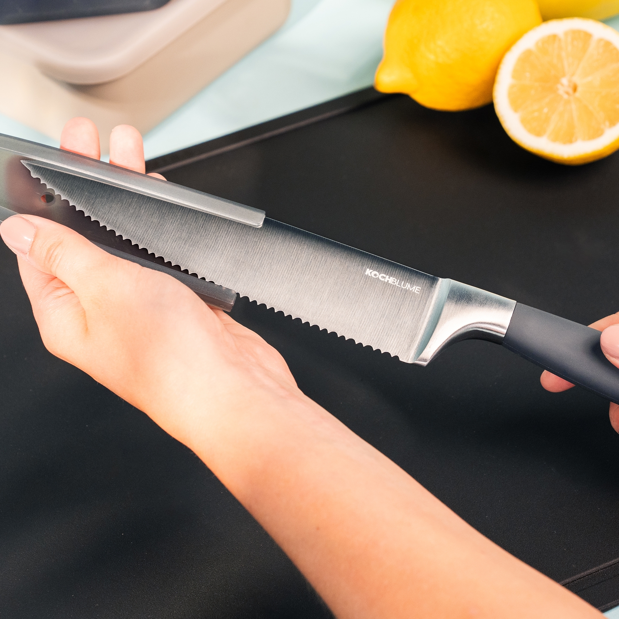 Kochblume - Chef's knife with serrated edge, red