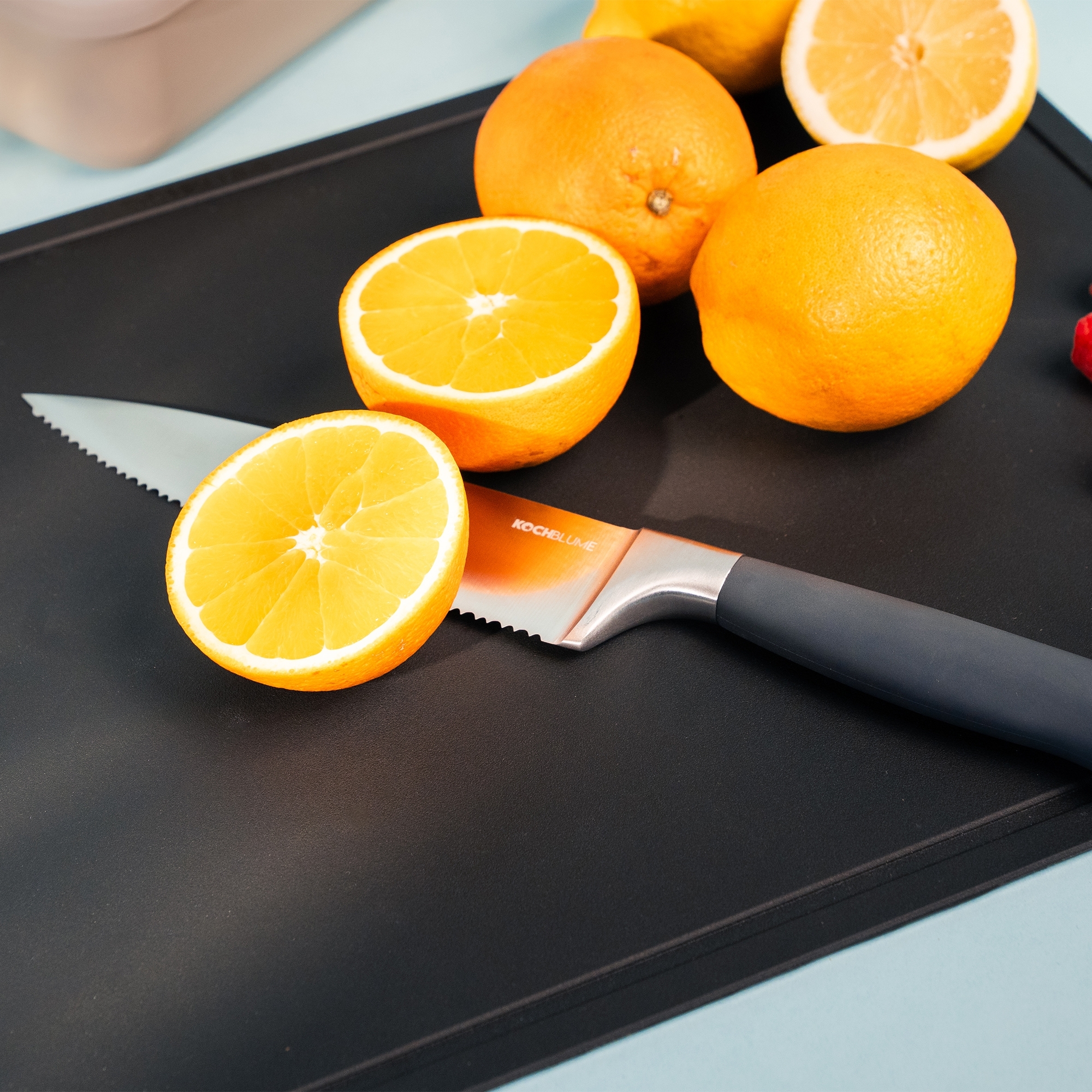 Kochblume - Chef's knife with serrated edge, red